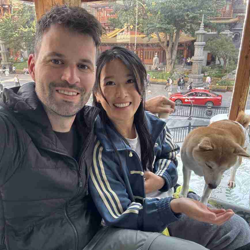 A couple in a dog cafe in Guangzhou, China