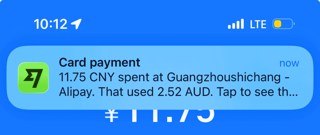 Alipay screen showing a successful payment for a coffee order using a linked international Wise card in China