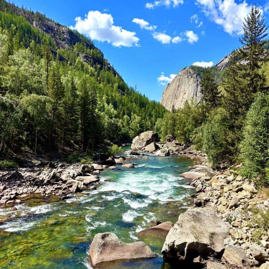 Scenic view of Keketuohai National Geopark with river and mountains.