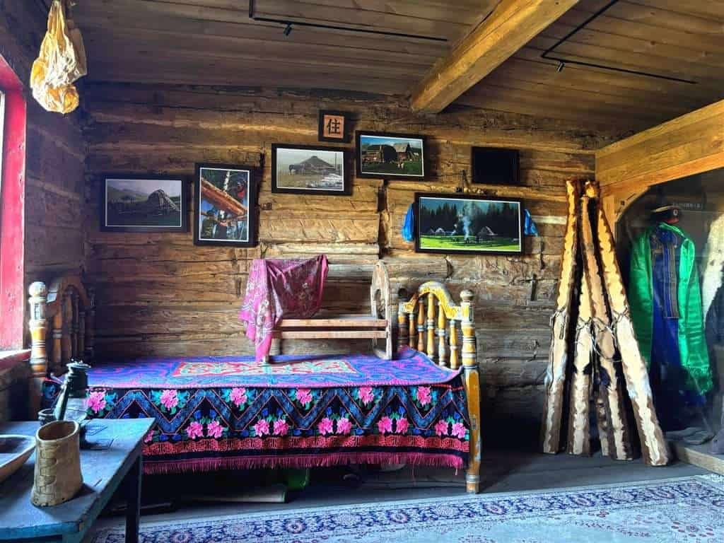 Interior of the Hundred Year Old House in Hemu Village, old photographs and artifacts on display