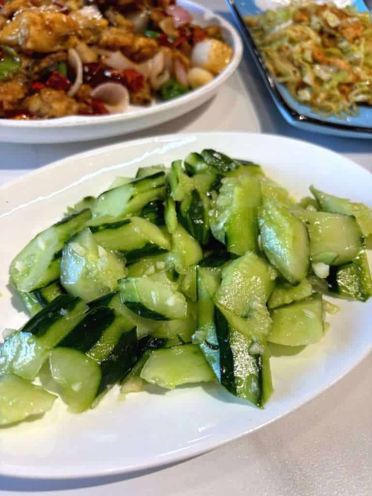 Smashed cucumber side dish, dinner in Altay