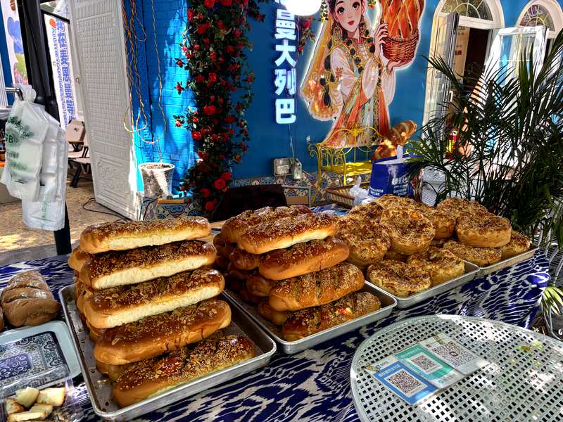 Fresh breads and naan at a bakery stall