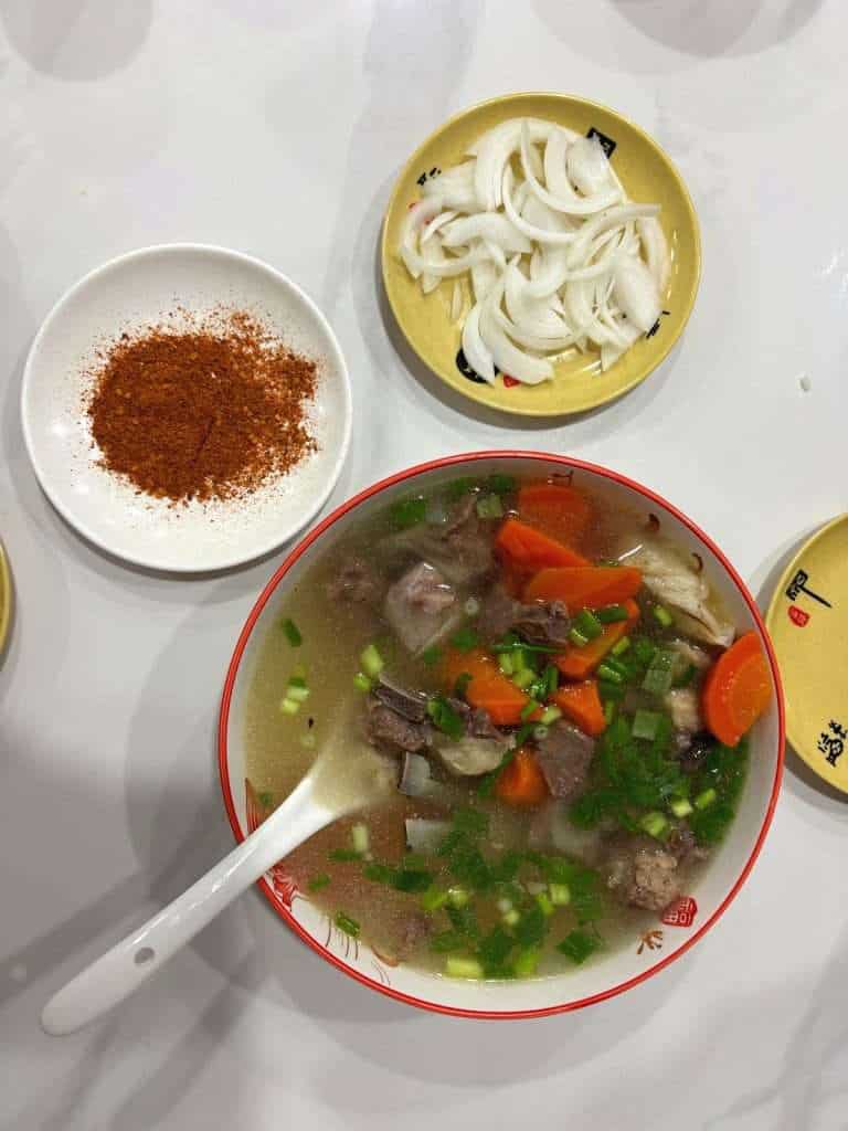 Clear stewed lamb soup with dipping spices, dinner in Keketuohai